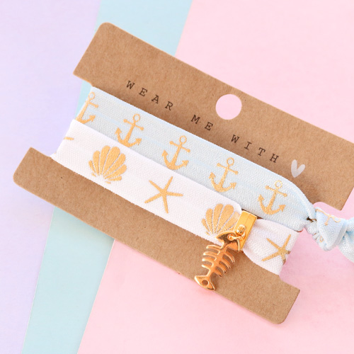 Must-have pour l&rsquo;&eacute;t&eacute; : bracelets + &eacute;lastiques &agrave; cheveux du ruban &eacute;lastique ! 