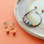 Magnifiques boucles d&rsquo;oreilles et bracelets dans des couleurs chaudes des perles Polaris Elements