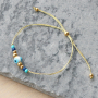 Confectionner de magnifiques bracelets avec les nouvelles perles &OElig;il porte-bonheur :