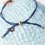 Confectionner de magnifiques bracelets avec les nouvelles perles &OElig;il porte-bonheur :
