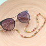 Jours ensoleill&eacute;s ! Cordons &agrave; lunettes de soleil DIY avec perles coquillage Cauri, pompons, macram&eacute; et plus !