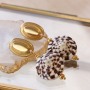 Cr&eacute;ez des bijoux de caract&egrave;re avec des perles coquillage et des appr&ecirc;ts de bijoux en acier inox 
