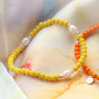 Confectionnez des bracelets multicolores avec des perles acryliques ! 