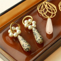 Comment cr&eacute;er des boucles d'oreilles tendance avec des perles en pierre naturelle?