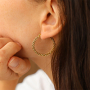 Conseils pour porter des boucles d'oreilles en acier inoxydable