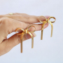 Inspiration bijou avec des boucles d'oreilles en acier inoxydable