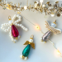 Cr&eacute;ez des designs magiques avec des perles Polaris en forme de goutte et des ailes d'ange !