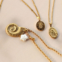 Cr&eacute;ez  des colliers avec des breloques et pendentifs en acier inoxydable